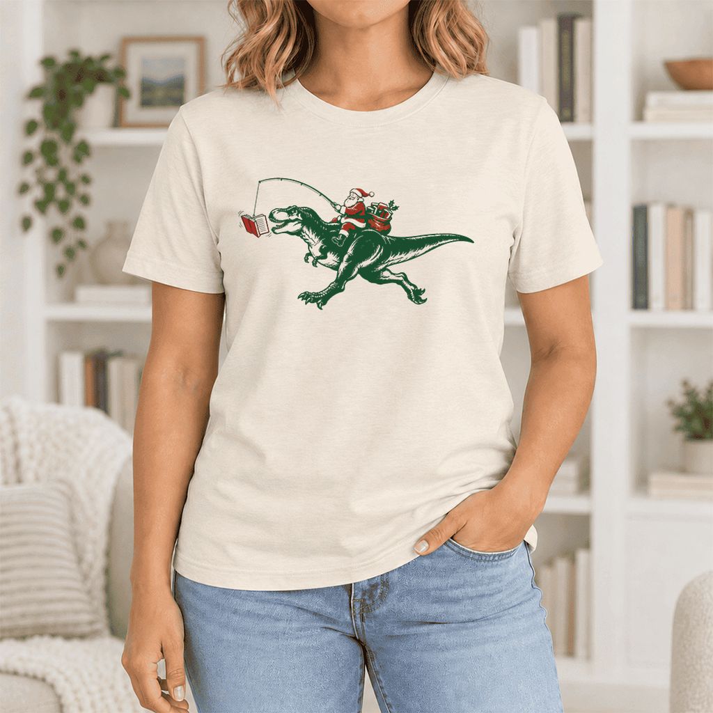 Santa Riding T-Rex Ultra-Soft Cotton T-Shirt | Christmas Reader Gift Natural