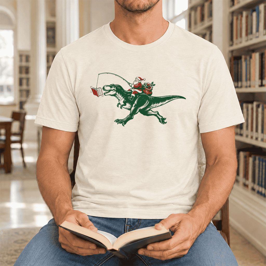 Santa Riding T-Rex Ultra-Soft Cotton T-Shirt | Christmas Reader Gift Natural