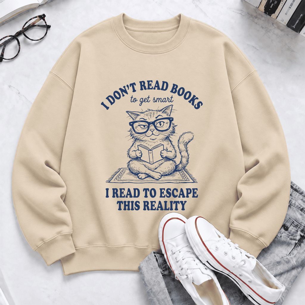 I Don't Read Books To Escape This Reality Softstyle Sweatshirt | Book Lover Gift Sand