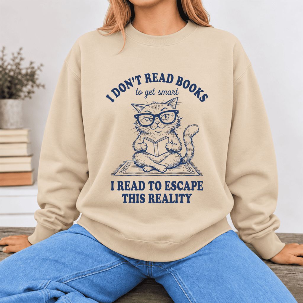 I Don't Read Books To Escape This Reality Softstyle Sweatshirt | Book Lover Gift Sand