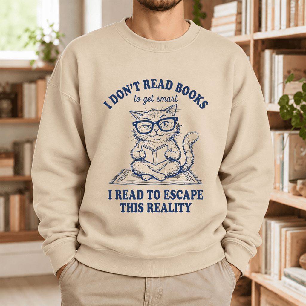 I Don't Read Books To Escape This Reality Softstyle Sweatshirt | Book Lover Gift Sand