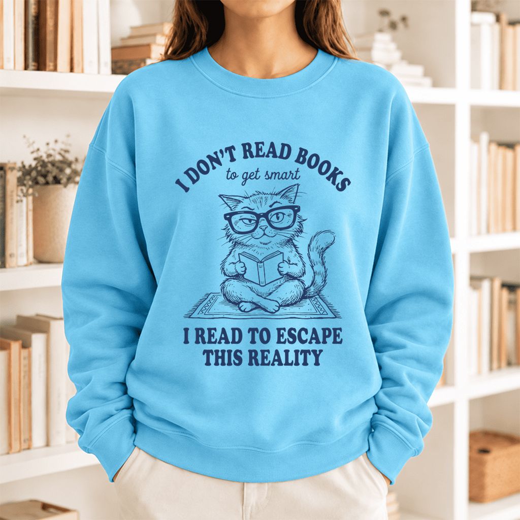I Don't Read Books To Escape This Reality Softstyle Sweatshirt | Book Lover Gift Sky