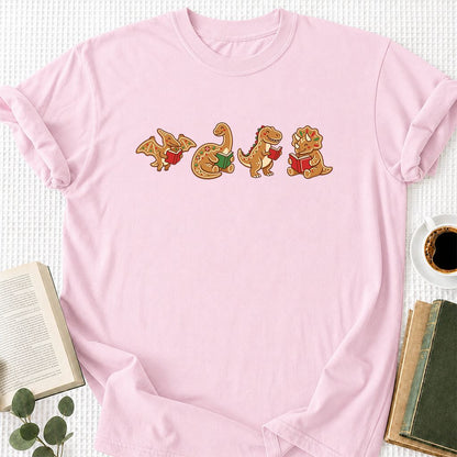 Four Gingerbread Dinosaur Reading Printed T-Shirt | Christmas Reading Gift Light Pink