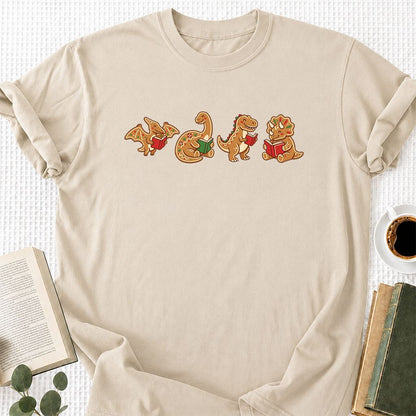 Four Gingerbread Dinosaur Reading Printed T-Shirt | Christmas Reading Gift Sand