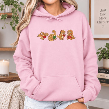 Four Gingerbread Dinosaur Reading Softstyle Hoodie | Christmas Reading Gift Light Pink