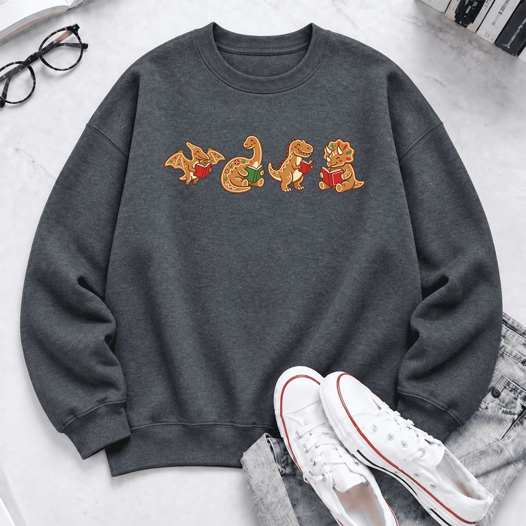Four Gingerbread Dinosaur Reading Softstyle Sweatshirt | Christmas Reading Gift Dark Heather