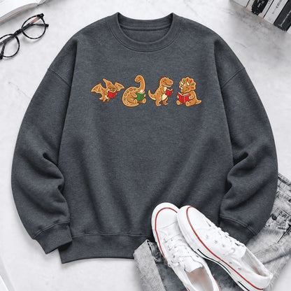 Four Gingerbread Dinosaur Reading Softstyle Sweatshirt | Christmas Reading Gift Dark Heather