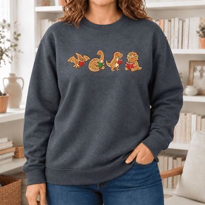 Four Gingerbread Dinosaur Reading Softstyle Sweatshirt | Christmas Reading Gift Dark Heather