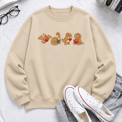 Four Gingerbread Dinosaur Reading Softstyle Sweatshirt | Christmas Reading Gift Sand