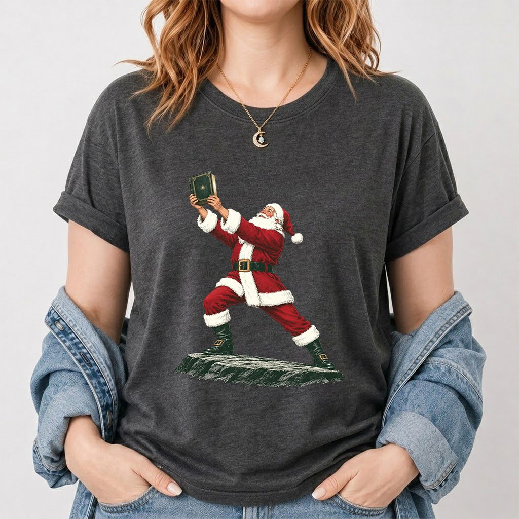 Santa Claus Holding Up A Green Book Printed T-Shirt | Christmas Gift Dark Heather
