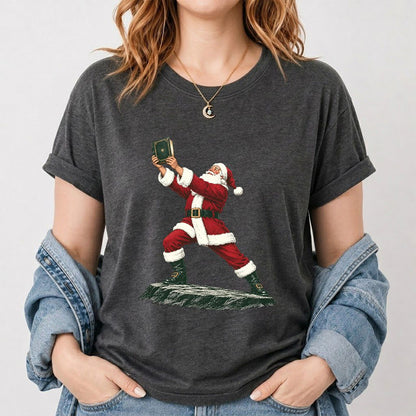 Santa Claus Holding Up A Green Book Printed T-Shirt | Christmas Gift Dark Heather