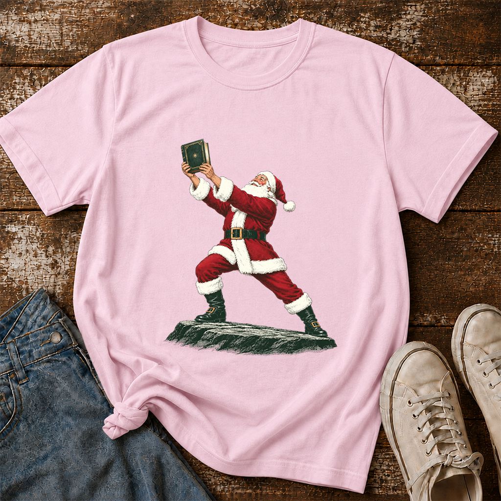 Santa Claus Holding Up A Green Book Printed T-Shirt | Christmas Gift Light Pink