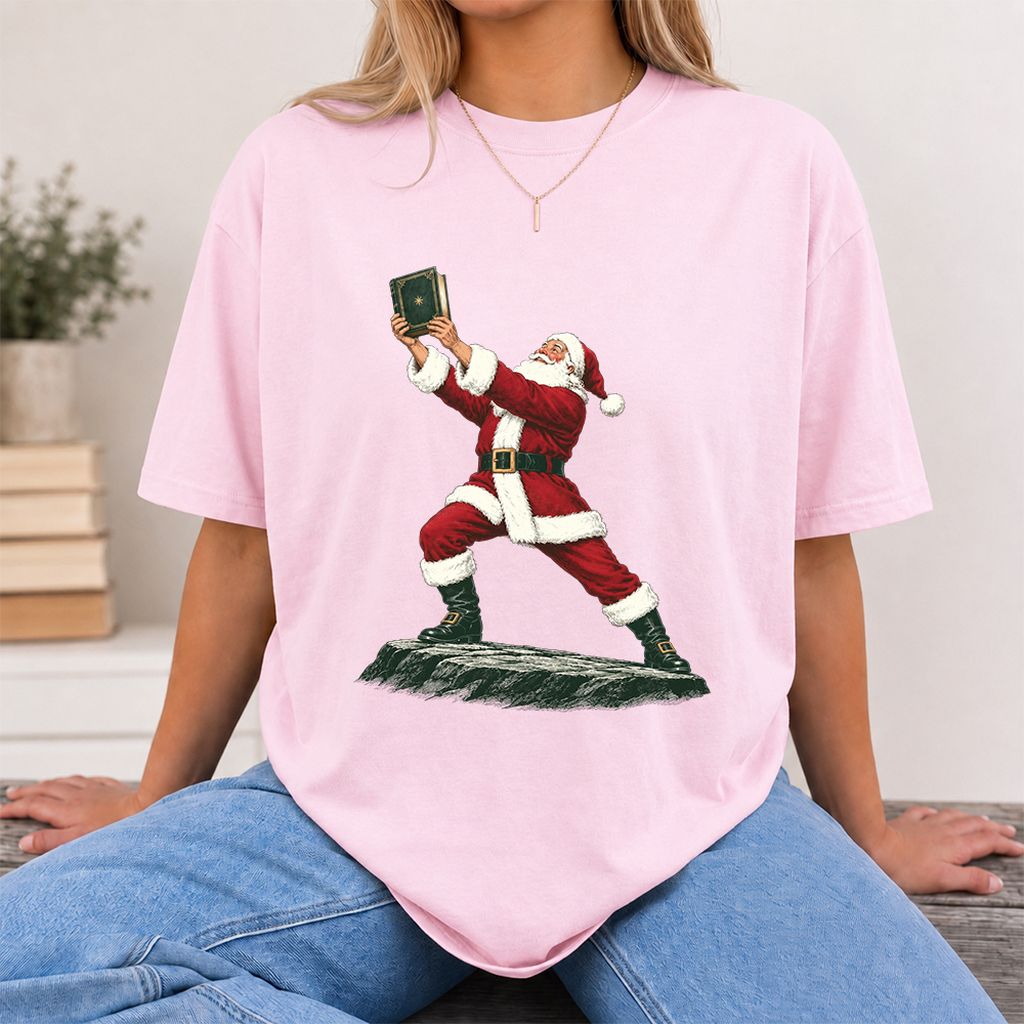 Santa Claus Holding Up A Green Book Printed T-Shirt | Christmas Gift Light Pink