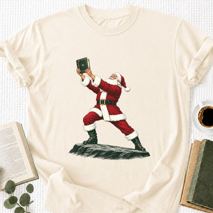 Santa Claus Holding Up A Green Book Printed T-Shirt | Christmas Gift Natural