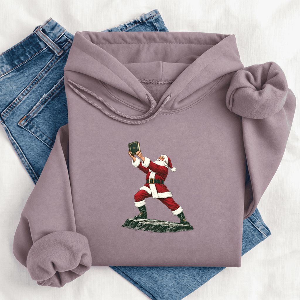 Santa Claus Holding Up A Green Book Softstyle Hoodie | Christmas Gift Paragon