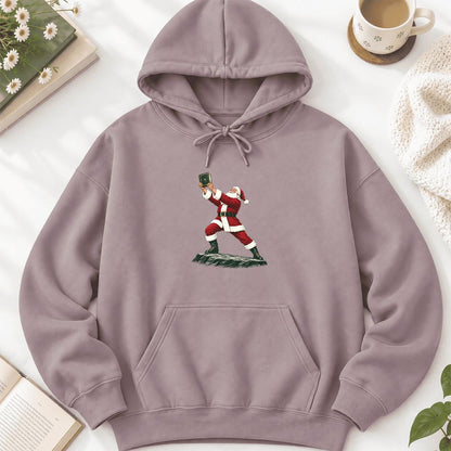 Santa Claus Holding Up A Green Book Softstyle Hoodie | Christmas Gift Paragon