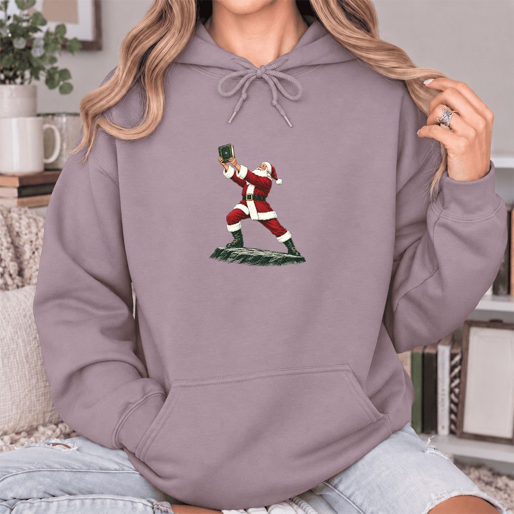 Santa Claus Holding Up A Green Book Softstyle Hoodie | Christmas Gift Paragon
