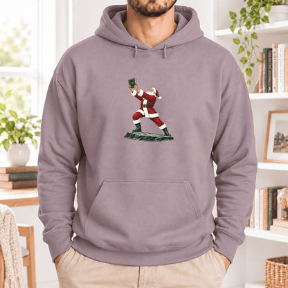 Santa Claus Holding Up A Green Book Softstyle Hoodie | Christmas Gift Paragon