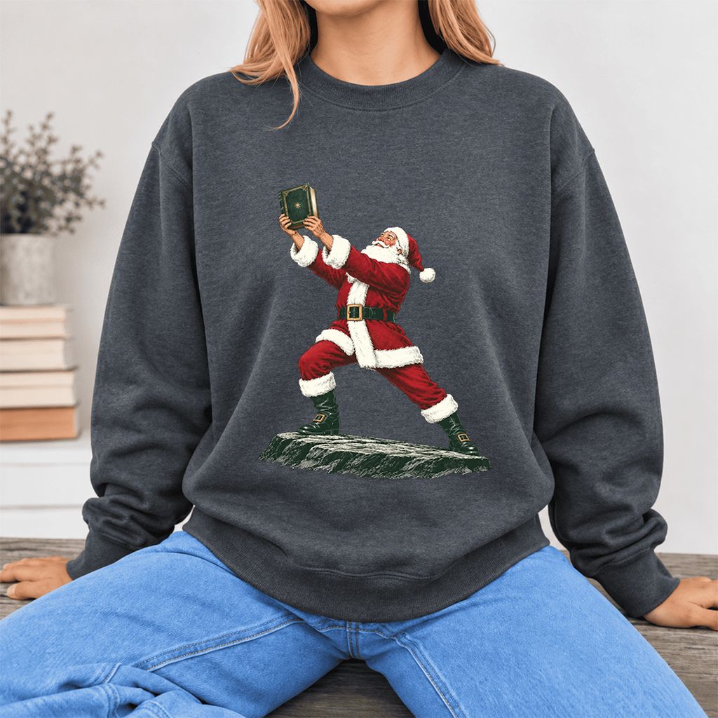 Santa Claus Holding Up A Green Book Softstyle Sweatshirt | Christmas Gift Dark Heather