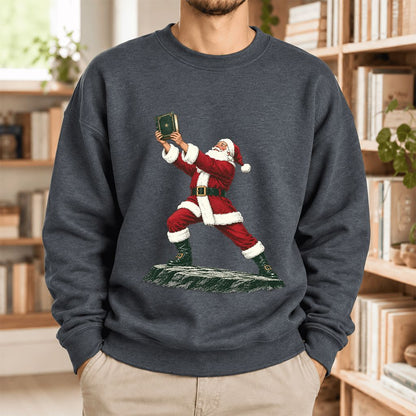 Santa Claus Holding Up A Green Book Softstyle Sweatshirt | Christmas Gift Dark Heather