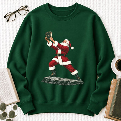Santa Claus Holding Up A Green Book Softstyle Sweatshirt | Christmas Gift Forest Green