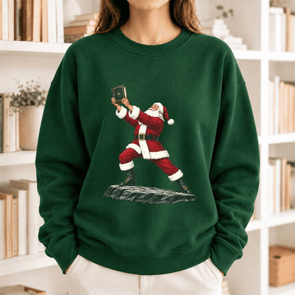 Santa Claus Holding Up A Green Book Softstyle Sweatshirt | Christmas Gift Forest Green