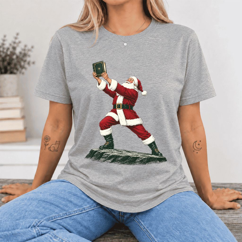 Santa Claus Holding Up A Green Book Ultra-Soft Cotton T-Shirt | Christmas Gift Athletic Heather