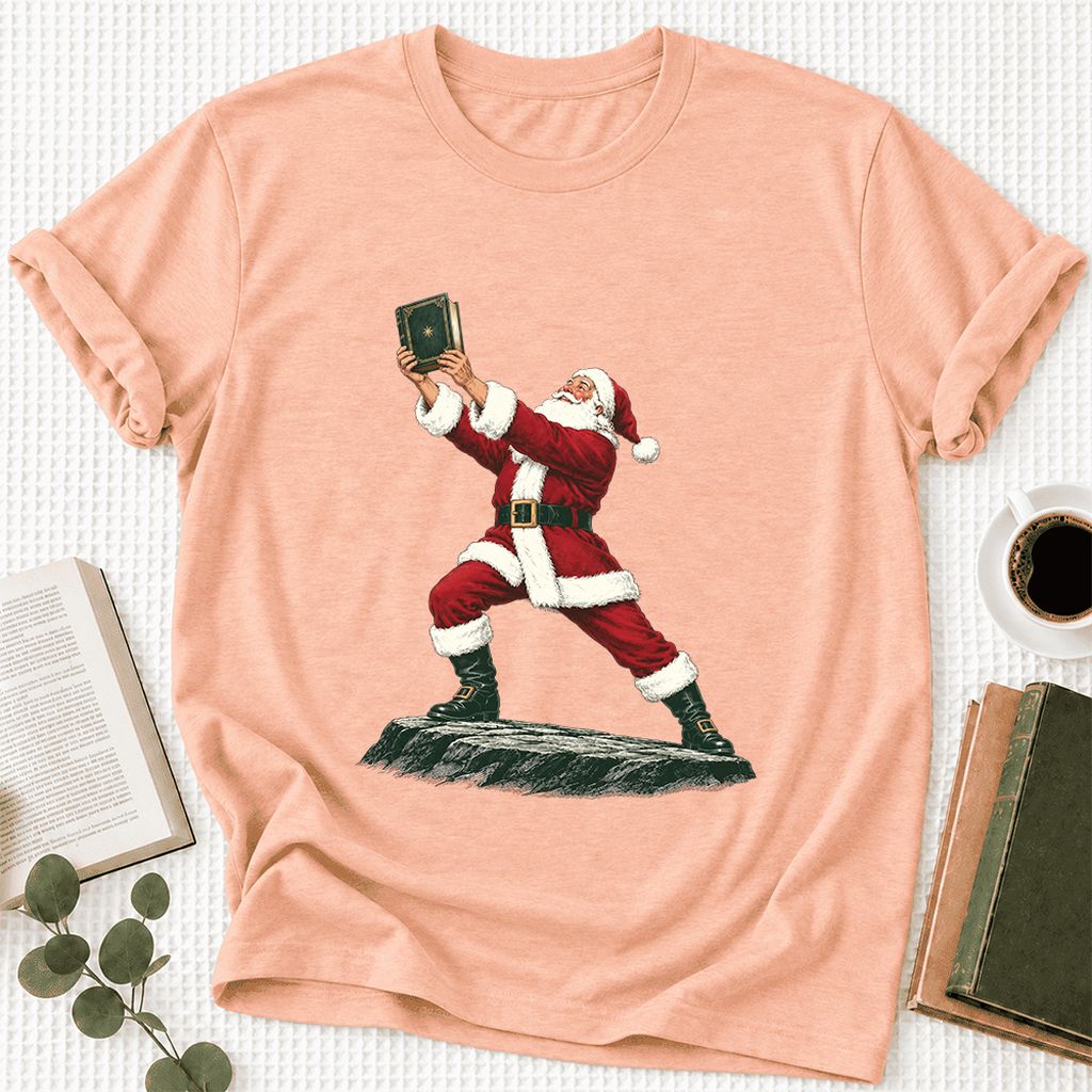 Santa Claus Holding Up A Green Book Ultra-Soft Cotton T-Shirt | Christmas Gift Heather Peach
