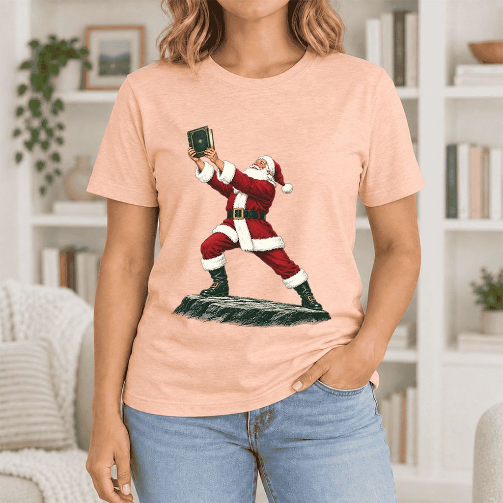 Santa Claus Holding Up A Green Book Ultra-Soft Cotton T-Shirt | Christmas Gift Heather Peach