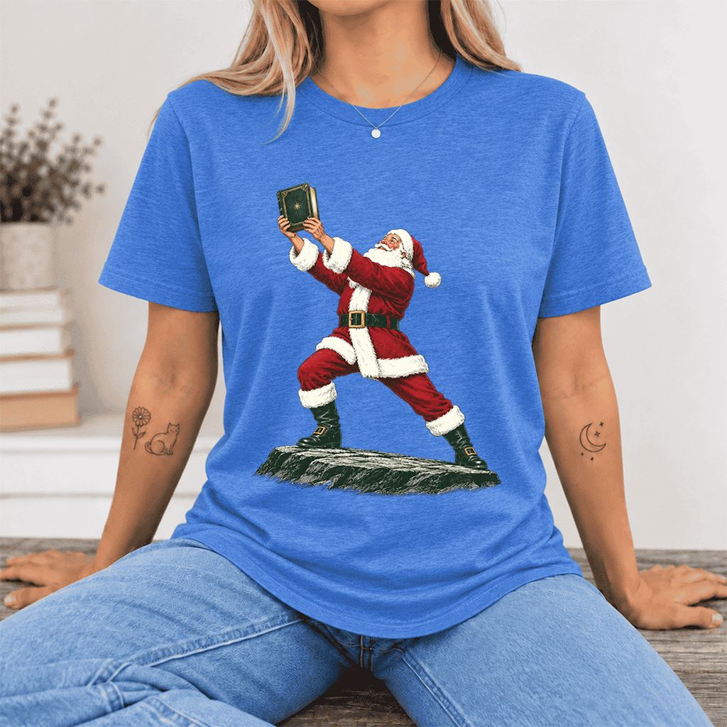 Santa Claus Holding Up A Green Book Ultra-Soft Cotton T-Shirt | Christmas Gift Heather True Royal
