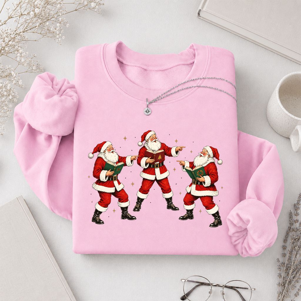 Three Reading Santas Printed Sweatshirt | Christmas Reader Gift Light Pink