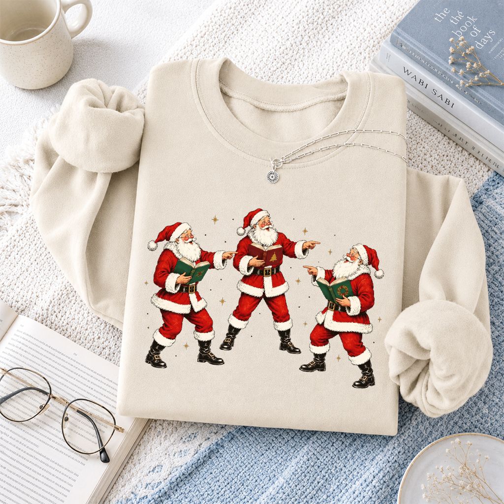 Three Reading Santas Printed Sweatshirt | Christmas Reader Gift Sand