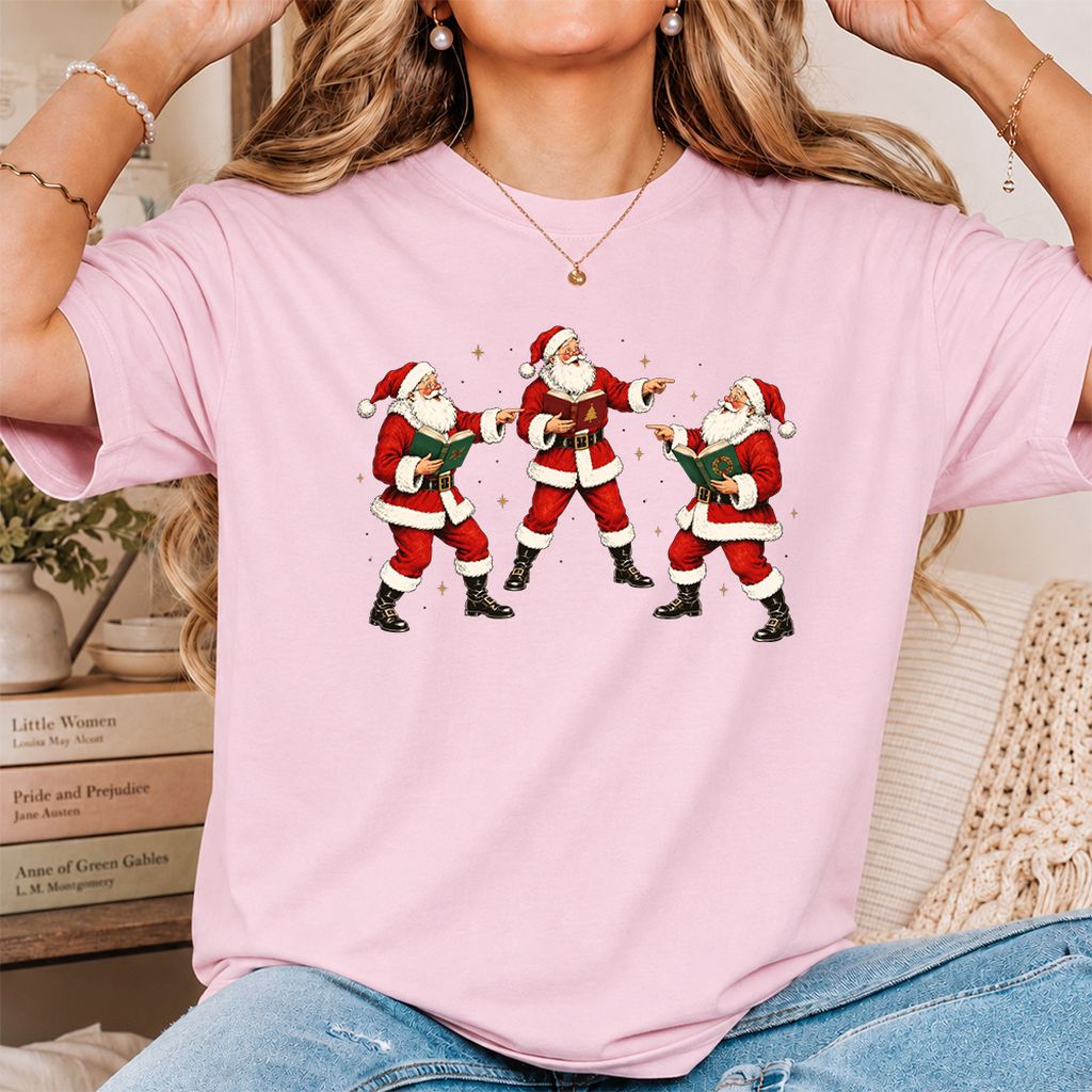 Three Reading Santas Printed T-Shirt | Christmas Reader Gift Light Pink