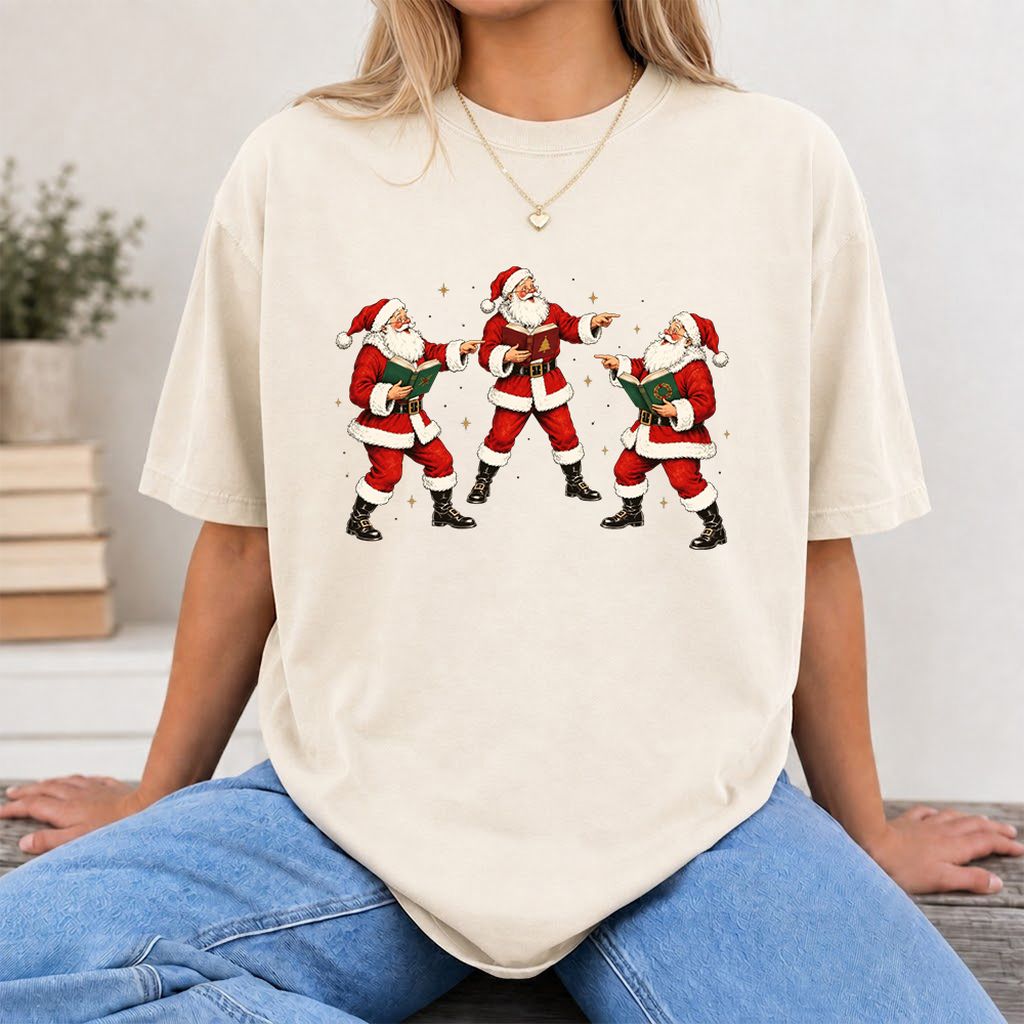Three Reading Santas Printed T-Shirt | Christmas Reader Gift Natural