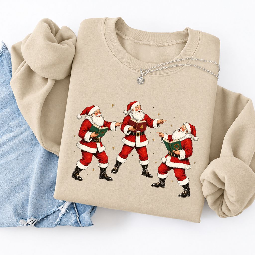 Three Reading Santas Softstyle Sweatshirt | Christmas Reader Gift Sand