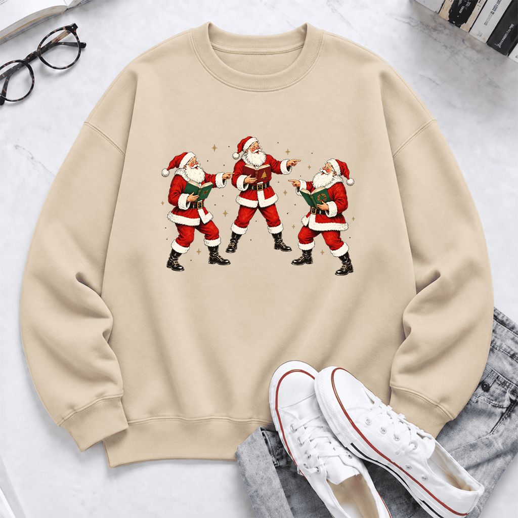 Three Reading Santas Softstyle Sweatshirt | Christmas Reader Gift Sand