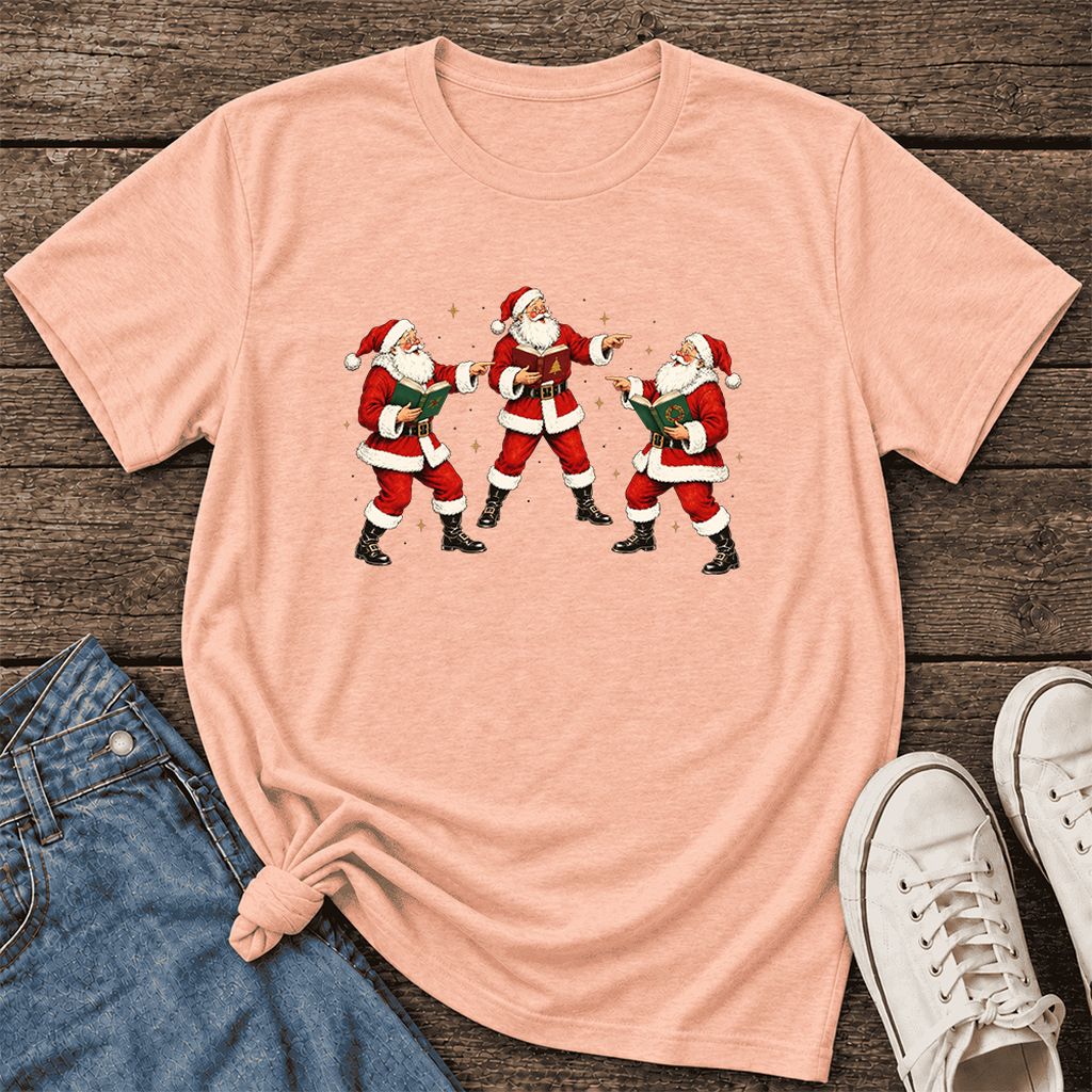 Three Reading Santas Ultra-Soft Cotton T-Shirt | Christmas Reader Gift Heather Peach