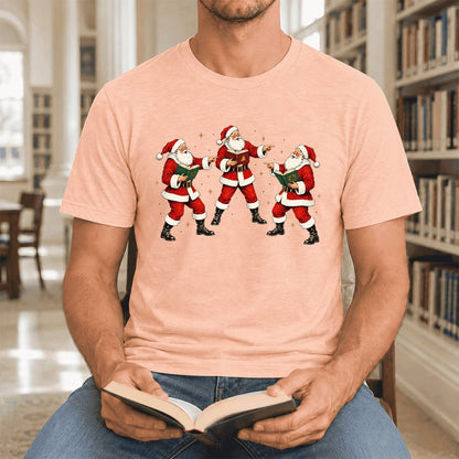 Three Reading Santas Ultra-Soft Cotton T-Shirt | Christmas Reader Gift Heather Peach