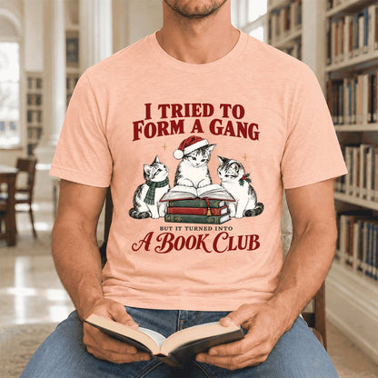To Form A Gang Ultra-Soft Cotton T-Shirt | Christmas Cat Reader Club Gift Heather Peach