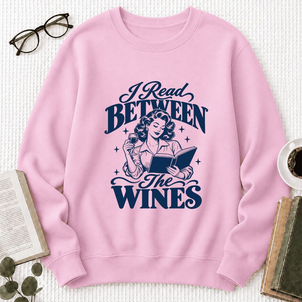 I Read Between The Wines Printed Sweatshirt | Cozy Book Lover Gift Light Pink