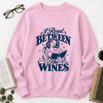 I Read Between The Wines Printed Sweatshirt | Cozy Book Lover Gift Light Pink
