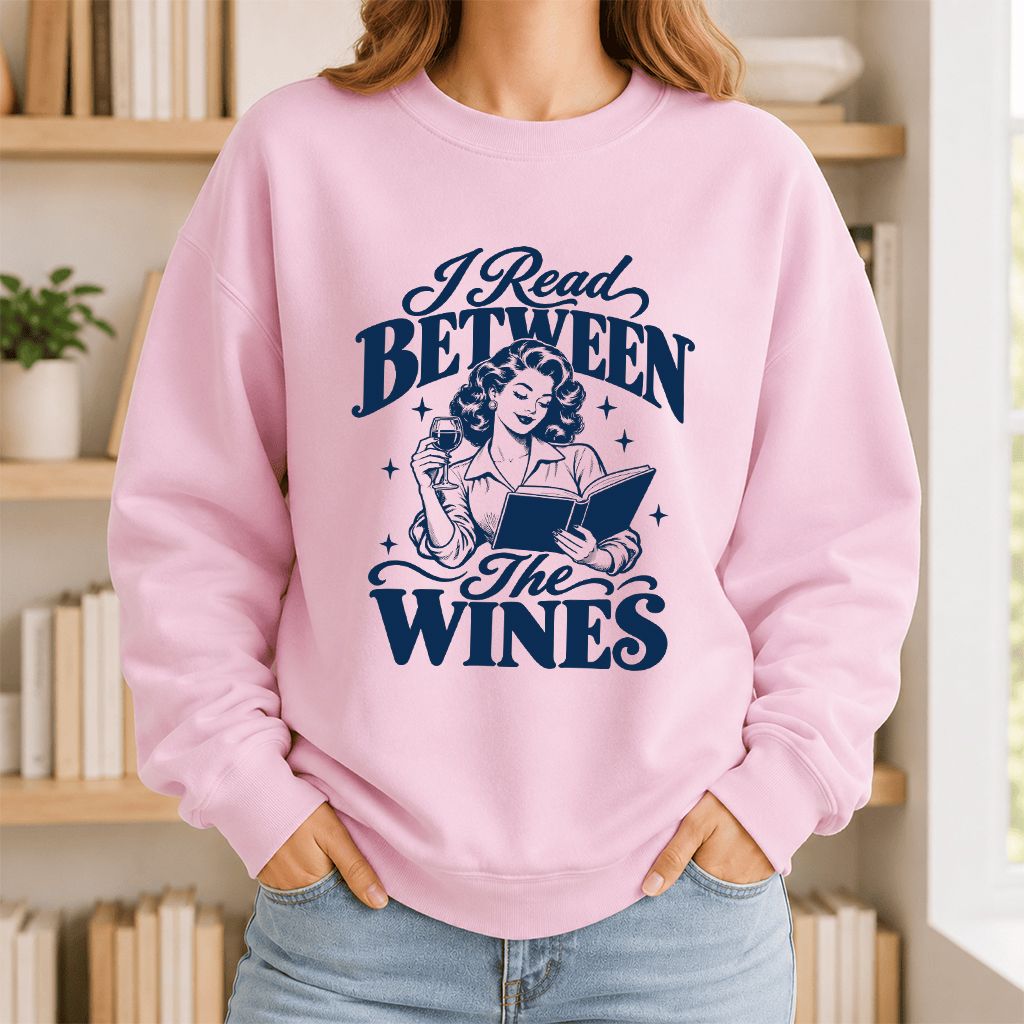 I Read Between The Wines Printed Sweatshirt | Cozy Book Lover Gift Light Pink