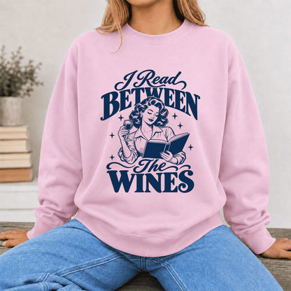 I Read Between The Wines Printed Sweatshirt | Cozy Book Lover Gift Light Pink