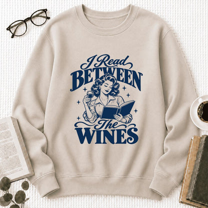 I Read Between The Wines Printed Sweatshirt | Cozy Book Lover Gift Sand