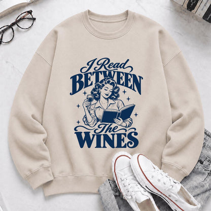 I Read Between The Wines Printed Sweatshirt | Cozy Book Lover Gift Sand
