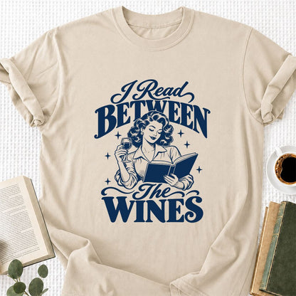 I Read Between The Wines Printed T-Shirt | Cozy Book Lover Gift Sand
