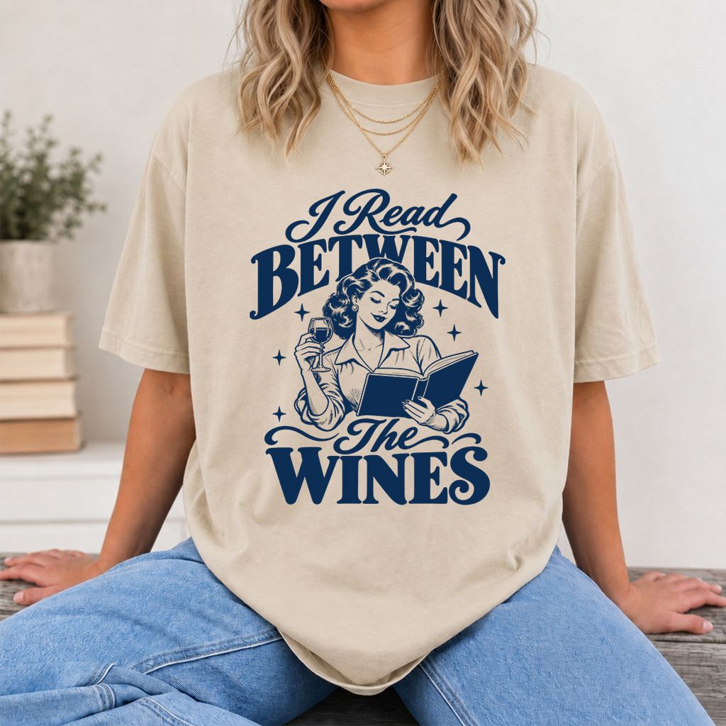 I Read Between The Wines Printed T-Shirt | Cozy Book Lover Gift Sand