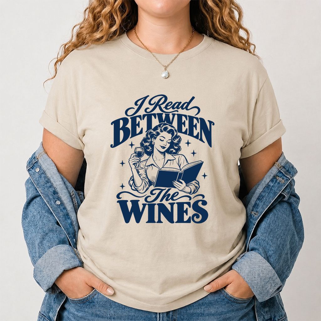 I Read Between The Wines Printed T-Shirt | Cozy Book Lover Gift Sand