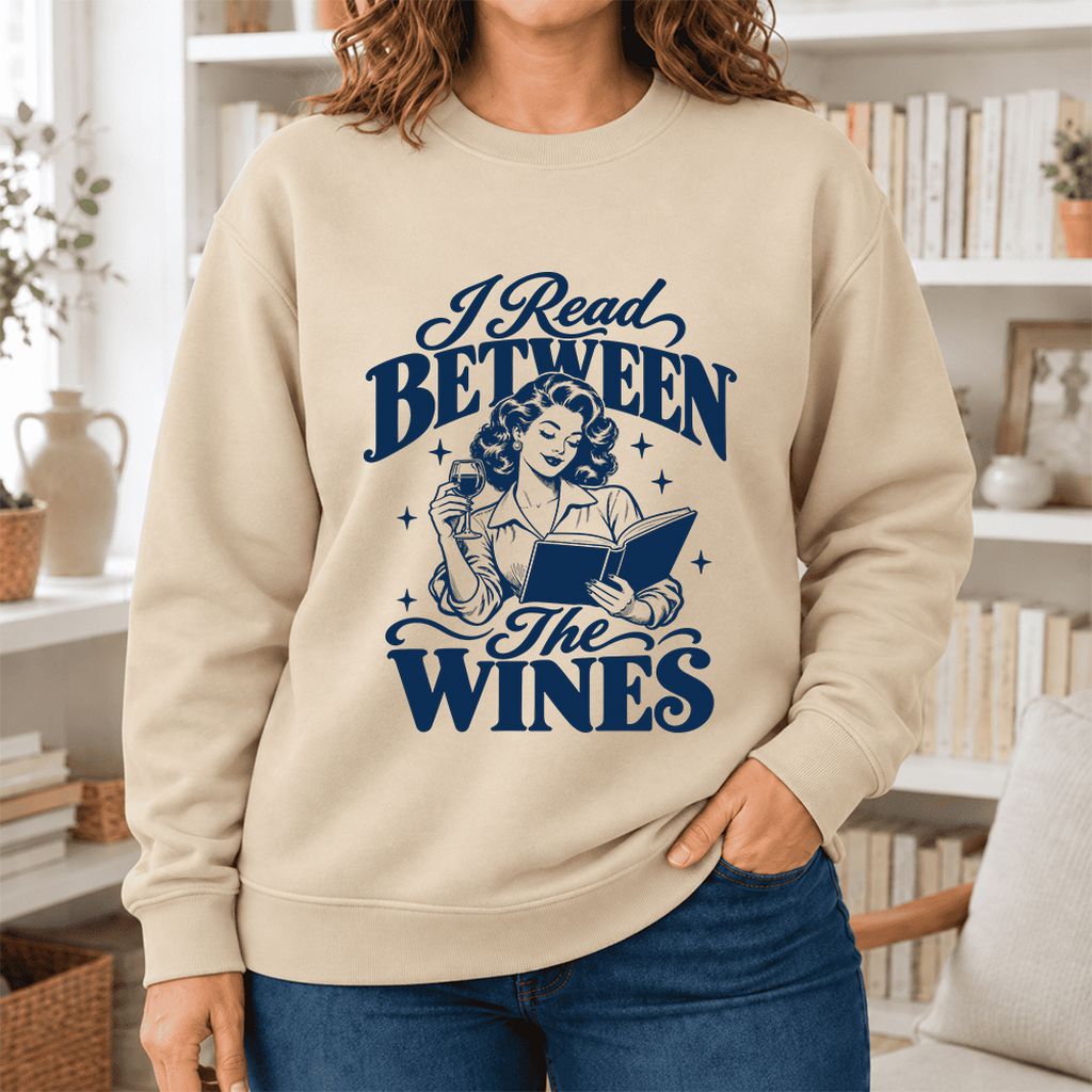 I Read Between The Wines Softstyle Sweatshirt | Cozy Book Lover Gift Sand