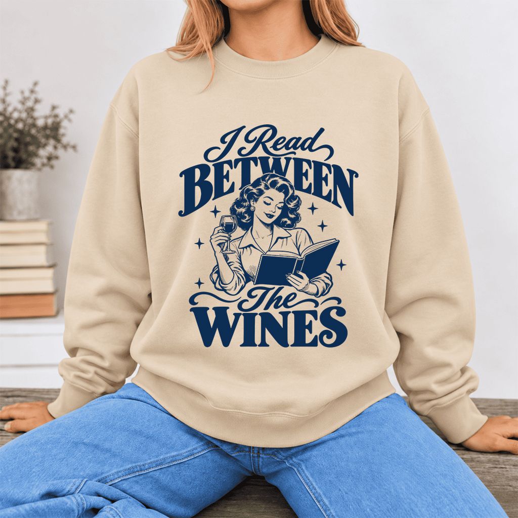 I Read Between The Wines Softstyle Sweatshirt | Cozy Book Lover Gift Sand